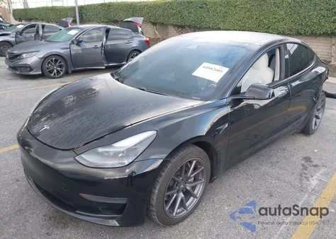 2021 Tesla Model 3 Standard Range Plus Rear-Wheel Drive from USA, damaged, VIN 5YJ3E1EA2MF938613